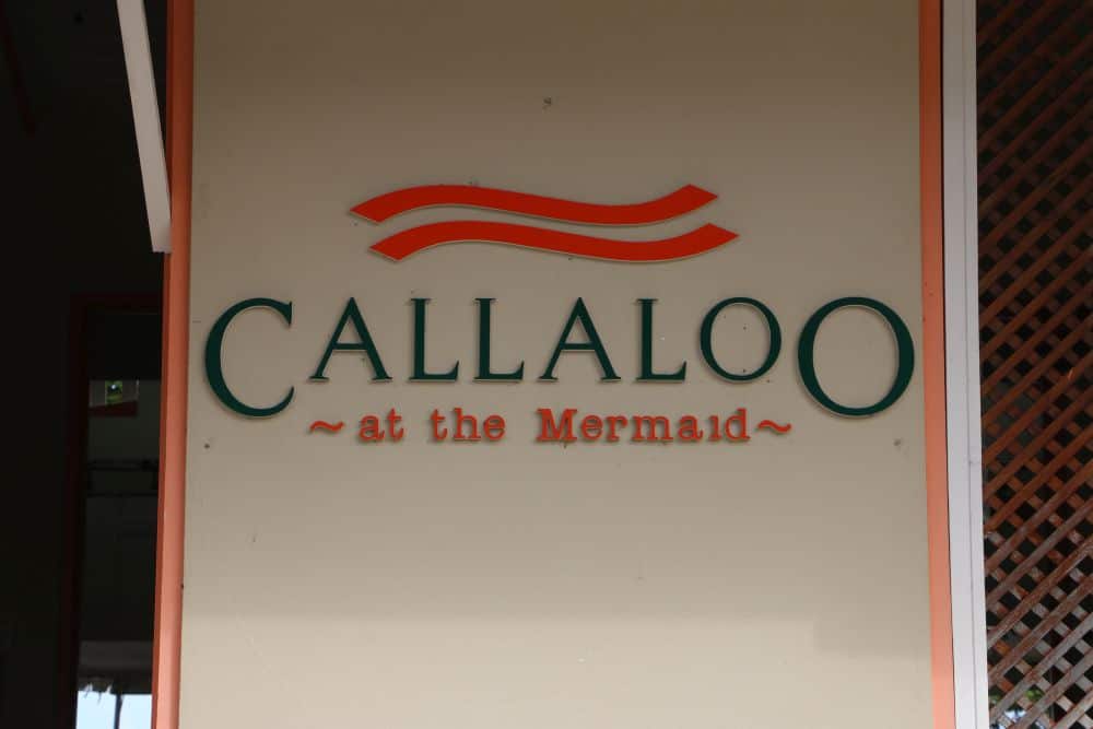 Callaloo restaurant at Mermaid hotel in Carriacou. Photo of Callaloo restaurant's sign.