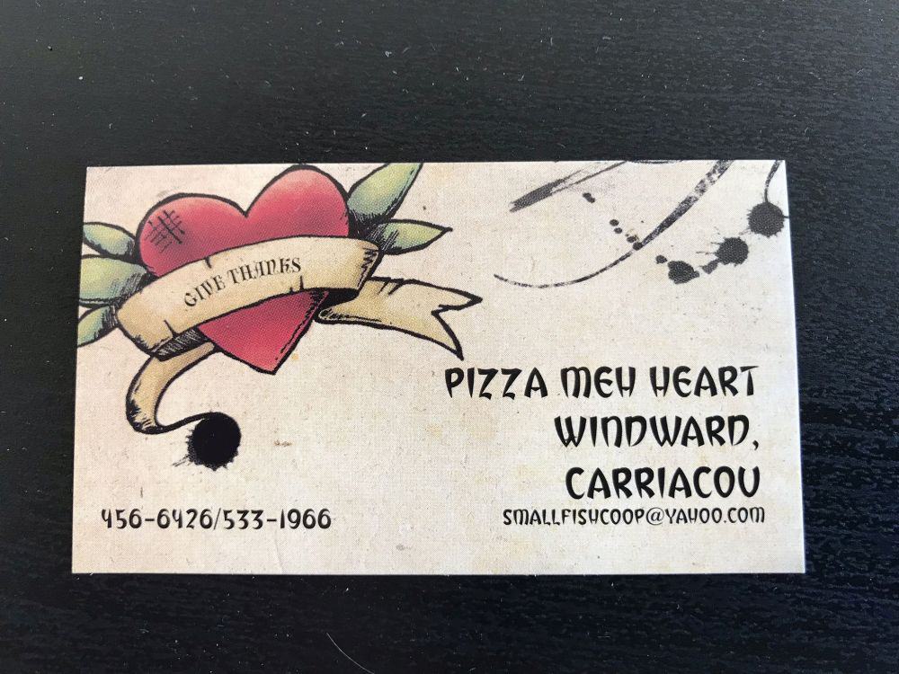 Pizza Meh Heart's business card. Photo of Pizza Meh Heart's business card.